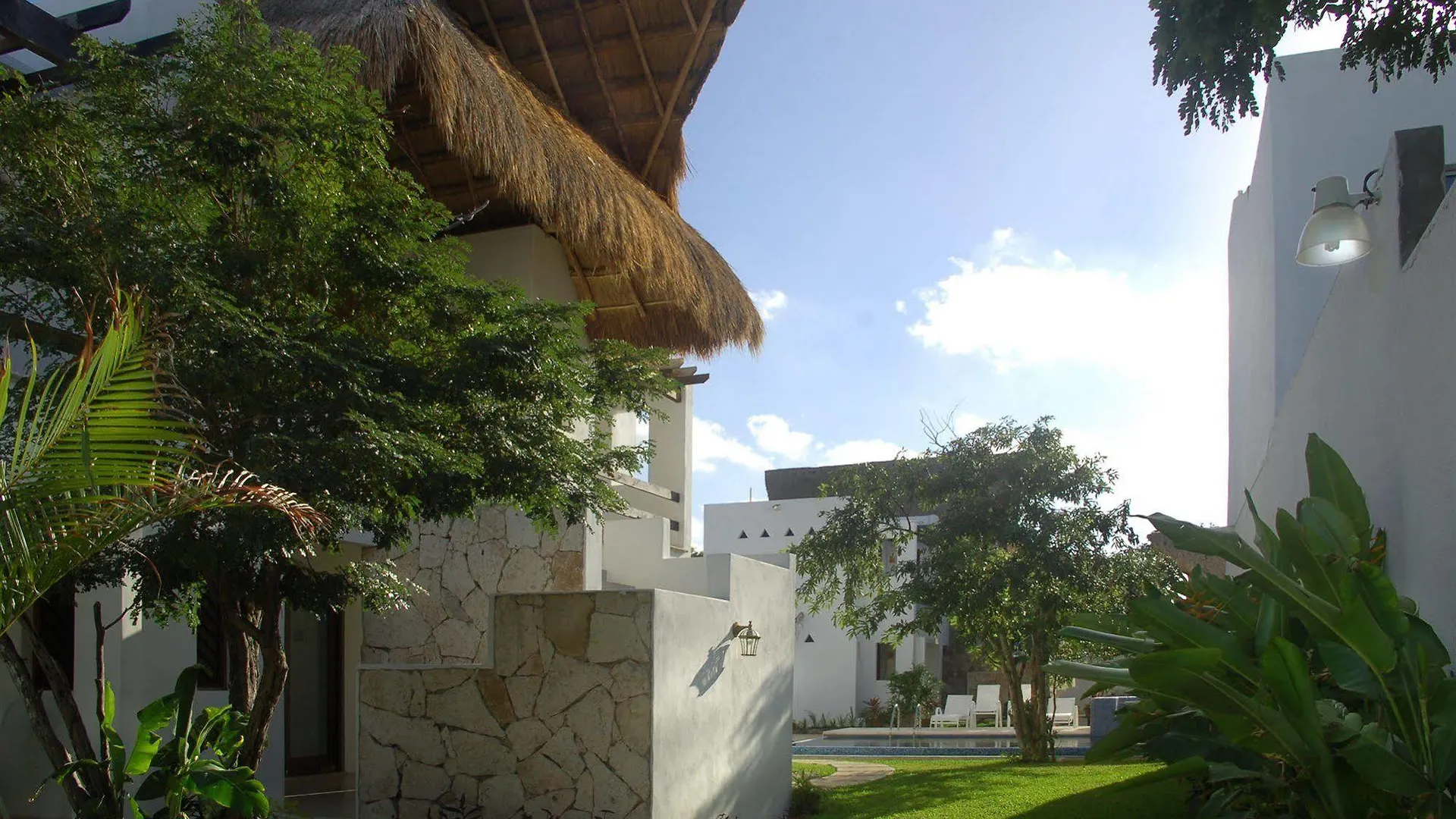 Villas El Encanto Косумель